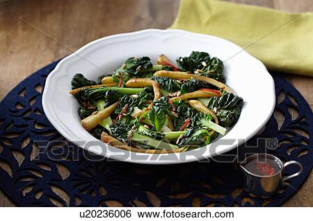 Chard and parsnip salad with pine nuts in bowl View Large Photo Image Stock Photograph - Chard and parsnip salad with pine nuts in bowl. Fotosearch