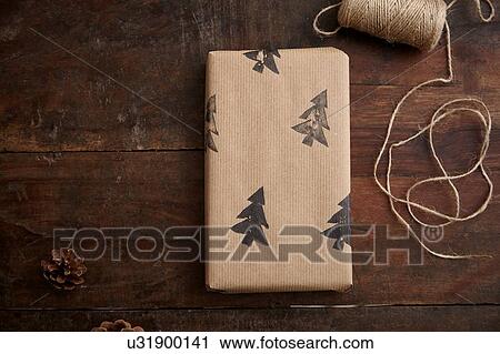 Stock Image - Christmas present and string. Fotosearch