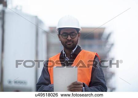 Stock Photograph - Civil engineer working at site. Fotosearch