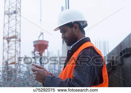 Civil engineer working at site View Large Photo Image Stock Photography - Civil engineer working at site. Fotosearch