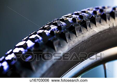 Close-up of a bicycle tyre. View Large Photo Image Stock Photograph - Close-up of a bicycle tyre.. Fotosearch