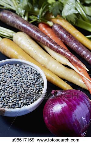 Stock Photo - Close up of colorful organic vegetables. Fotosearch