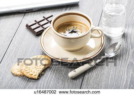 Stock Image - Coffee and snacks.. Fotosearch