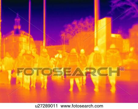 Stock Image - Commuters outside station, London, UK. Fotosearch