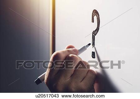 Confused businessman writing question mark on whiteboard. View Large Photo Image Stock Image - Confused businessman writing question mark on whiteboard.. Fotosearch
