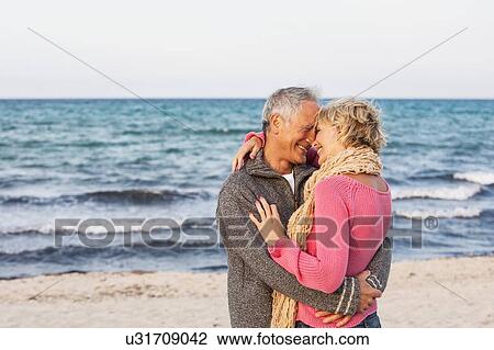 Couple hugging on beach, Palma de Mallorca, Spain View Large Photo Image Stock Image - Couple hugging on beach, Palma de Mallorca, Spain. Fotosearch