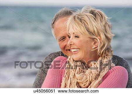 Couple hugging on beach, Palma de Mallorca, Spain View Large Photo Image Stock Image - Couple hugging on beach, Palma de Mallorca, Spain. Fotosearch