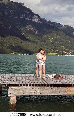 Couple hugging on pier, Innsbruck, Tirol, Austria, Europe View Large Photo Image Stock Image - Couple hugging on pier, Innsbruck, Tirol, Austria, Europe. Fotosearch