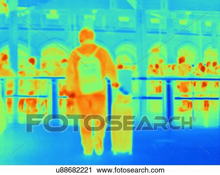 Stock Image - Crowds and queues during rush hour. Fotosearch