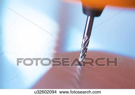 Picture - Cutting tool on CNC milling machine.. Fotosearch