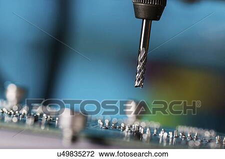 Stock Image - Cutting tool on CNC milling machine.. Fotosearch