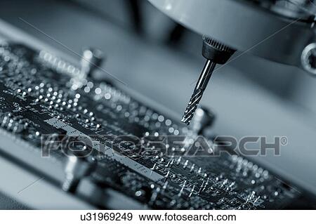 Stock Photo - Cutting tool on CNC milling machine.. Fotosearch