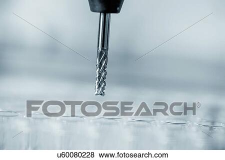 Stock Photo - Cutting tool on CNC milling machine.. Fotosearch