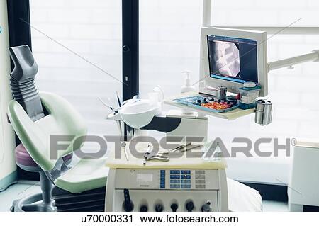 Dentist chair and equipment in dentist office View Large Photo Image Stock Image - Dentist chair and equipment in dentist office. Fotosearch