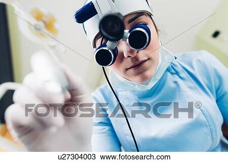 Dentist examining patient, personal perspective View Large Photo Image Stock Image - Dentist examining patient, personal perspective. Fotosearch