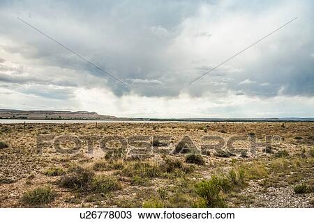 Stock Image - Dry flat landscape, Montana, US. Fotosearch
