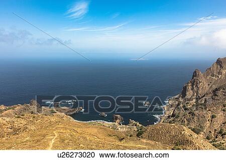 Stock Image - Elevated view of rugged coastline and sea, Nova Sintra, Brava, Cape Verde, Africa. Fotosearch