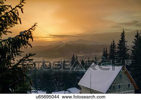 Elevated view of snow capped mountains at sunset, Gurne, Ukraine, Eastern Europe View Large Photo Image Picture - Elevated view of snow capped mountains at sunset, Gurne, Ukraine, Eastern Europe. Fotosearch