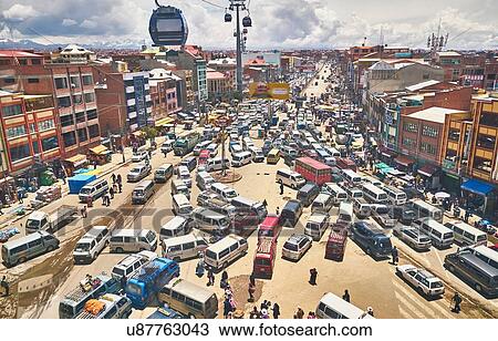 Stock Image - Elevated view of traffic in city, El Alto, La Paz, Bolivia, South America. Fotosearch