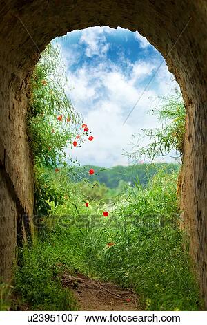 Stock Photo - End of the tunnel, conceptual image.. Fotosearch