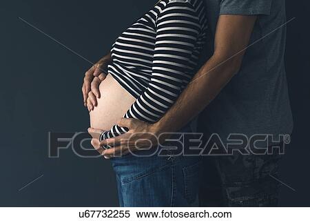 Stock Photography - Expectant couple.. Fotosearch