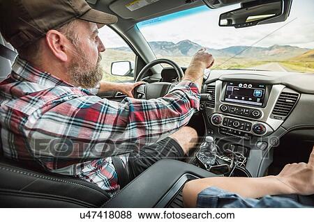 Stock Photo - Father and son on road trip. Fotosearch