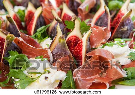 Fig, cured ham and mozzarella salad View Large Photo Image Stock Photograph - Fig, cured ham and mozzarella salad. Fotosearch