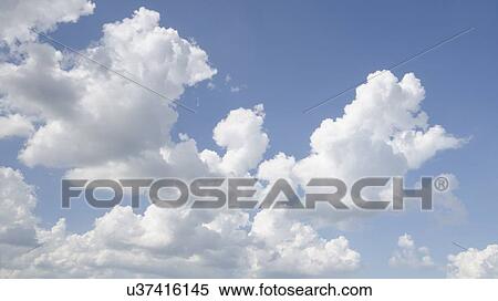 Stock Photography - Fluffy clouds. Fotosearch