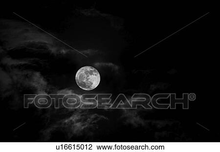 Stock Image - Full moon in night sky. Fotosearch