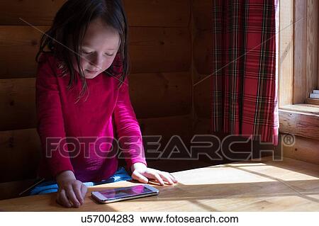 Girl using smartphone View Large Photo Image Stock Image - Girl using smartphone. Fotosearch
