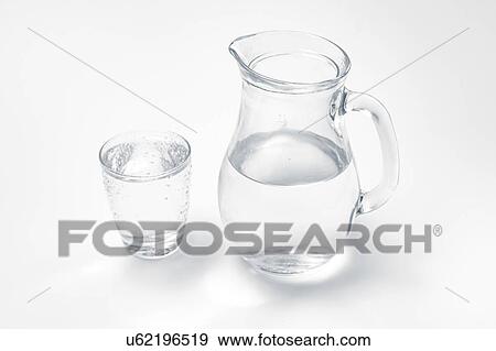 Stock Photo - Glass and jug with drinking water.. Fotosearch