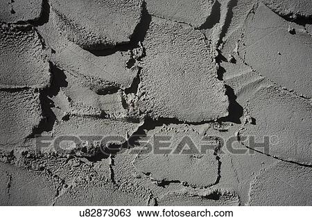 Stock Image - Grey cement on wall. Fotosearch
