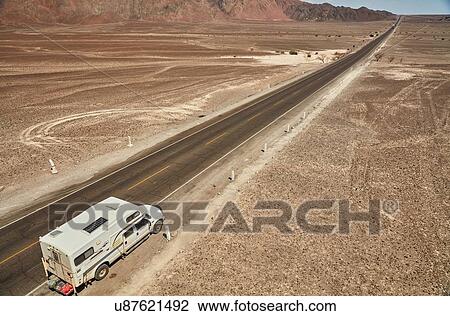 High angle view of campervan parked on desert roadside, Hacienda Ventilla, Ica, Peru View Large Photo Image Stock Image - High angle view of campervan parked on desert roadside, Hacienda Ventilla, Ica, Peru. Fotosearch