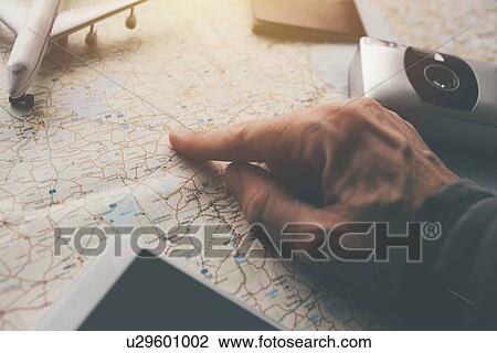 Stock Image - Holiday planning.. Fotosearch