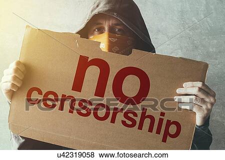 Stock Photo - Hooded activist with No Censorship protest sign, conceptual image.. Fotosearch