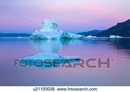Icebergs in calm water during midnight sun, Jakobshavn, Vestgronland, Greenland View Large Photo Image Stock Photo - Icebergs in calm water during midnight sun, Jakobshavn, Vestgronland, Greenland. Fotosearch