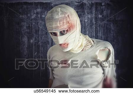 Stock Photography - Injured man with head bandages.. Fotosearch
