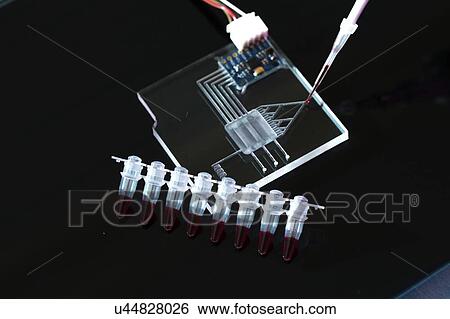 Stock Photograph - Lab on a chip (LOC).. Fotosearch