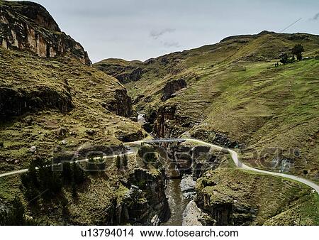 Landscape view of bridge crossing river ravine, Huinchiri, Cusco, Peru View Large Photo Image Picture - Landscape view of bridge crossing river ravine, Huinchiri, Cusco, Peru. Fotosearch