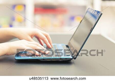 Stock Image - Laptop use.. Fotosearch