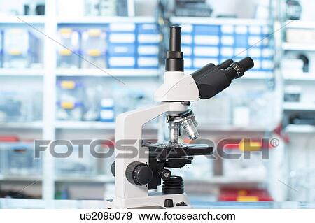 Light microscope in lab. View Large Photo Image Stock Photo - Light microscope in lab.. Fotosearch