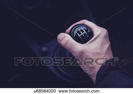 Male hand changing gear in the car. View Large Photo Image Stock Image - Male hand changing gear in the car.. Fotosearch