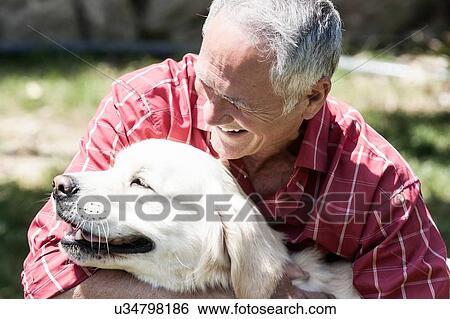 Stock Photograph - Man and pet dog. Fotosearch