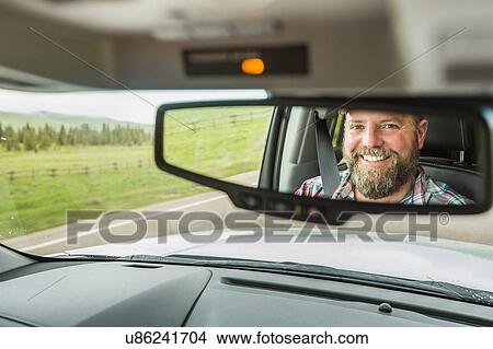 Picture - Man on road trip. Fotosearch