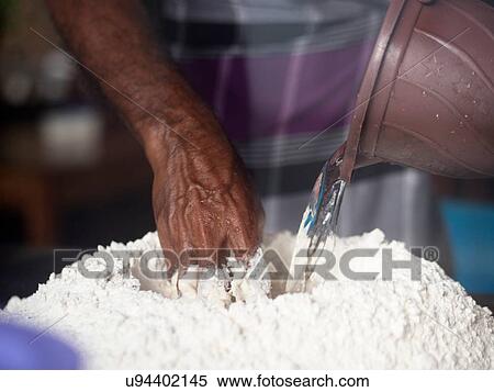 Man preparing roti dough View Large Photo Image Stock Photography - Man preparing roti dough. Fotosearch
