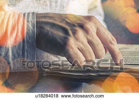 Man reading old book with torn pages. View Large Photo Image Stock Photo - Man reading old book with torn pages.. Fotosearch