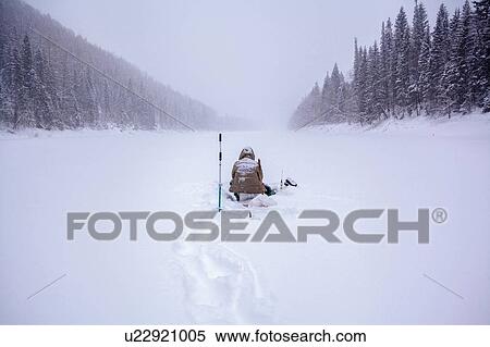Man sitting down in heavy snow, Ural, Sverdlovsk, Russia View Large Photo Image Stock Photography - Man sitting down in heavy snow, Ural, Sverdlovsk, Russia. Fotosearch