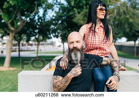 Mature hipster couple in park, portrait, Valencia, Spain View Large Photo Image Stock Photo - Mature hipster couple in park, portrait, Valencia, Spain. Fotosearch