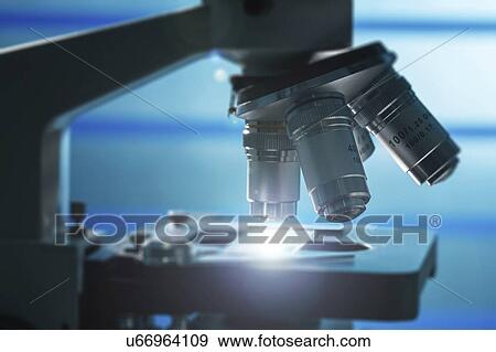 Stock Photo - Microscope stage and lenses.. Fotosearch