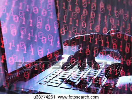 Stock Image - MODEL RELEASED. Cyber attack, conceptual image. Hacker accessing somebody else's computer programme.. Fotosearch